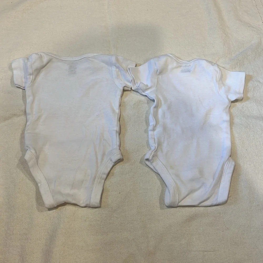 Assorted White Newborn Onesies